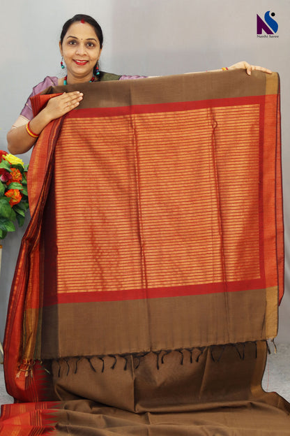 Soft earthy tones and gentle weave define this light brown handloom saree