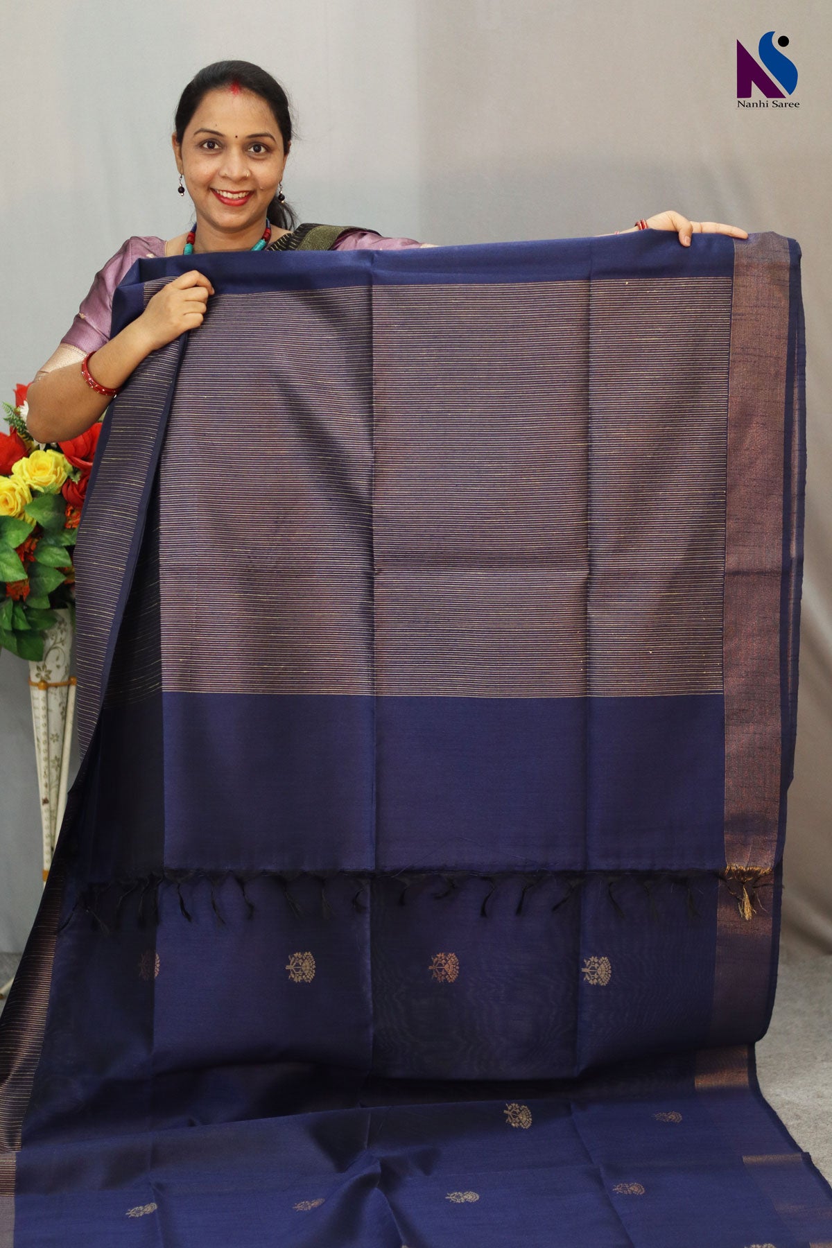 Rich navy blue color blended with timeless handloom artistry saree