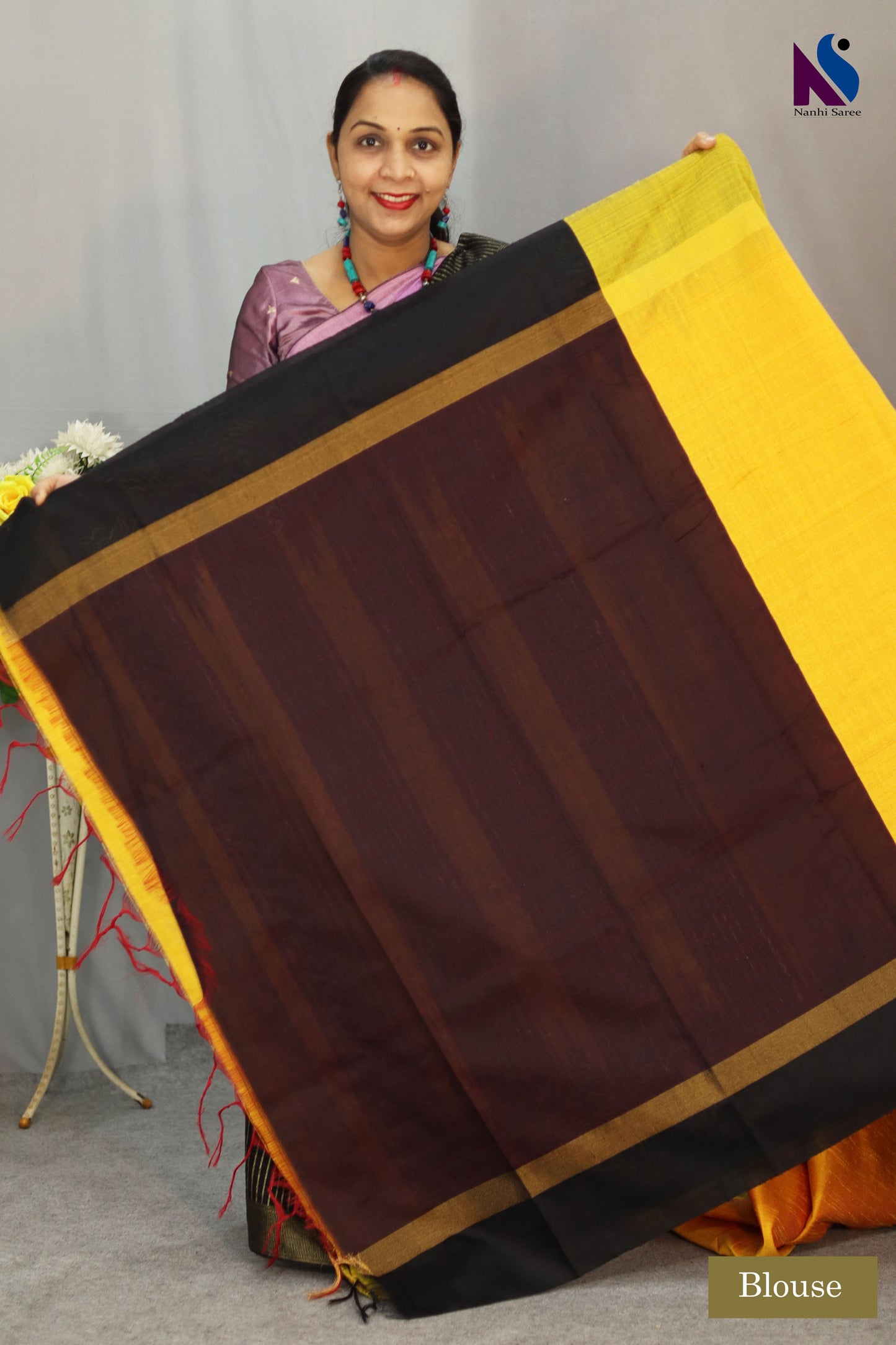 Soft light yellow handloom saree perfect for daytime elegance