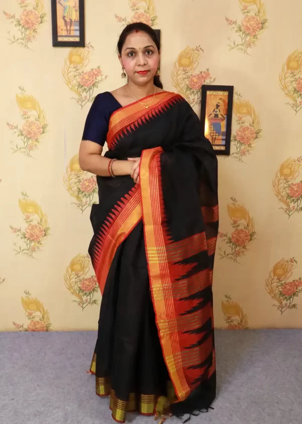 "Elegant black art silk saree with beautifully designed pallu."