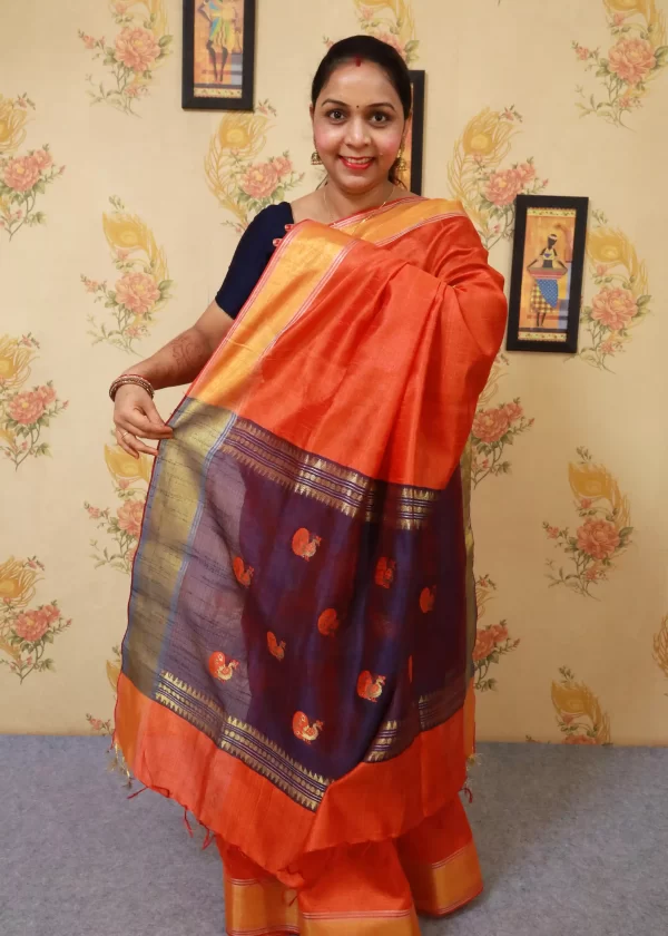 Orange colour Saree with Elegant Violet Pallu Design"Art Silk" - Image 2