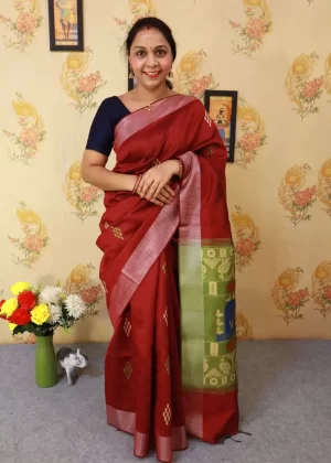 "Rich wine red art silk saree with mesmerizing pallu design."
