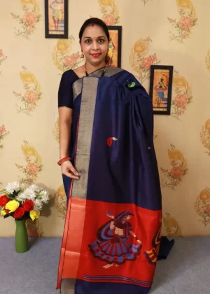"Elegant navy blue hand-woven saree, crafted with intricate artistry."