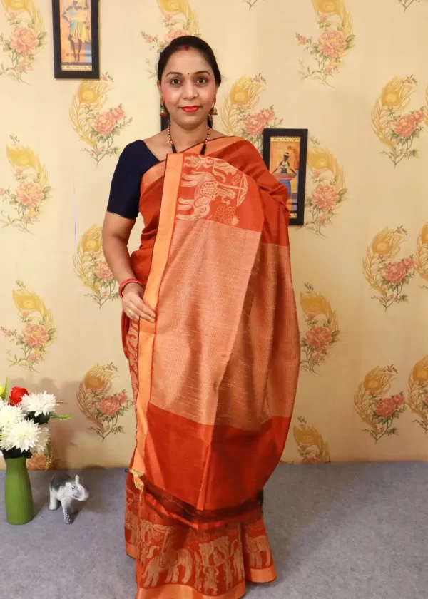 "Elegant rust orange art silk saree with timeless pallu design." - Image 2