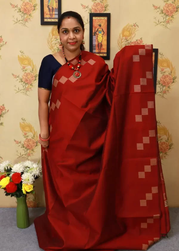 Handcrafted saree, radiating timeless elegance in red." - Image 2