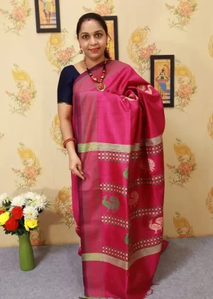 Traditional artistry meets timeless beauty in this pink saree."