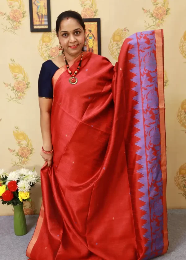 Graceful handloom saree, radiating charm in deep red." - Image 2
