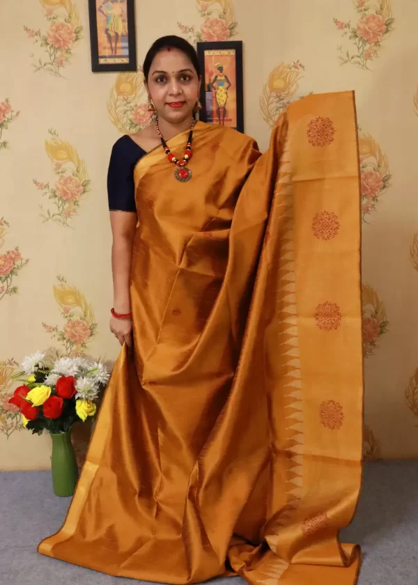 "Elegant orange and turmeric yellow hand-woven saree, crafted beautifully." - Image 2