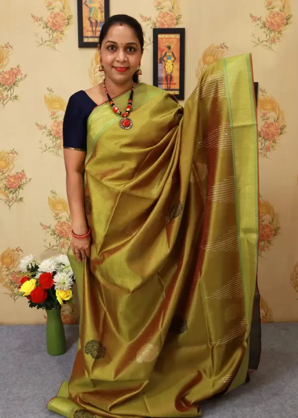 Graceful hand-woven saree, shining in lemon yellow." - Image 2