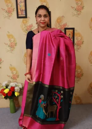 "Beautiful pink hand-woven saree, crafted with fine artistry."