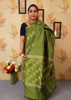 "Graceful mehendi green hand-woven saree, woven with elegance."